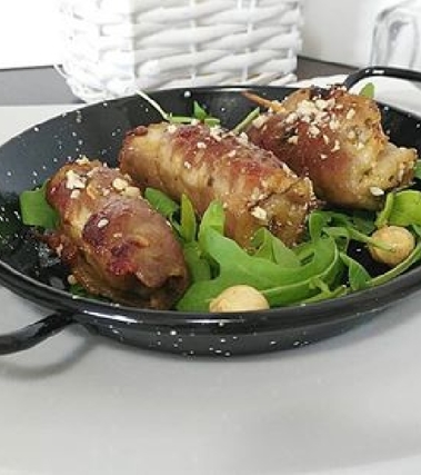 Involtini di arista alle nocciole e rughetta