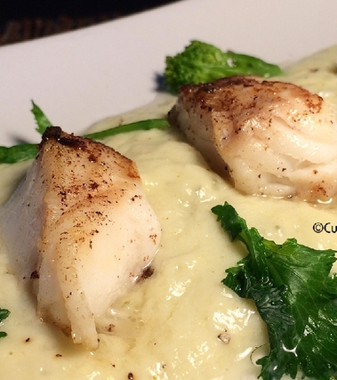 Merluzzo su crema di asparagi e cime di rapa