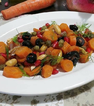 Carote al melograno e arachidi