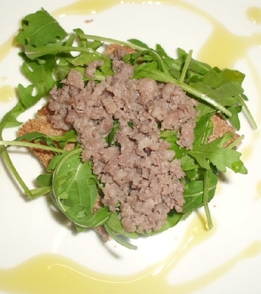 Bruschetta rucola e salsiccia aromatizzata bimby