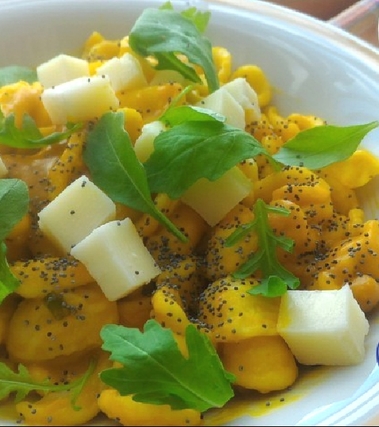 Orecchiette in crema di zucca con rucola e tuma