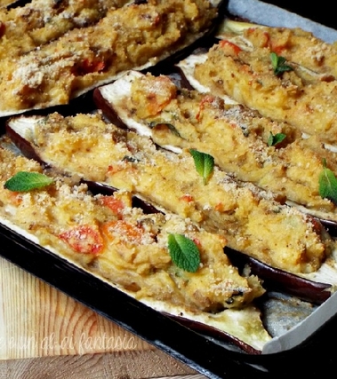 Melanzane in barchetta patate, pomodorini e menta