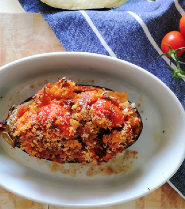 Melanzane ripiene di reginette, pomodori e capperi