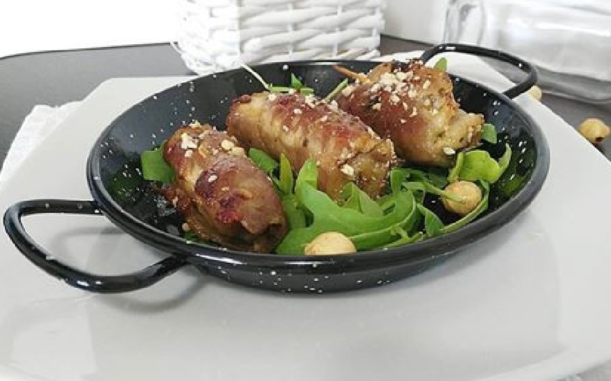 Involtini di arista alle nocciole e rughetta