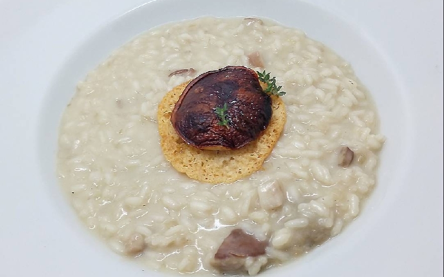 Porcini e risotto con cialda di grana padano