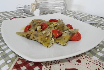 Ravioli al radicchio con ricotta e noci