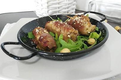 Involtini di arista alle nocciole e rughetta