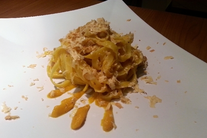 Tagliatelle zucca, salsiccia e ricotta infornata