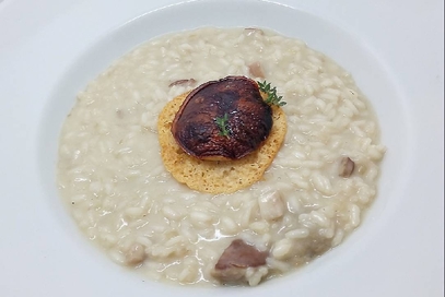 Porcini e risotto con cialda di grana padano