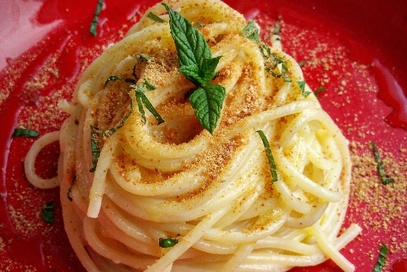 Spaghetti con fonduta di taleggio e bottarga