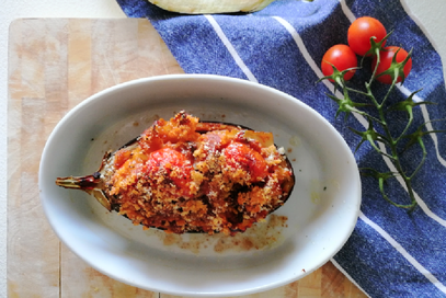 Melanzane ripiene di reginette, pomodori e capperi