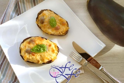 Barchette di melanzane ripiene di riso e pomodori